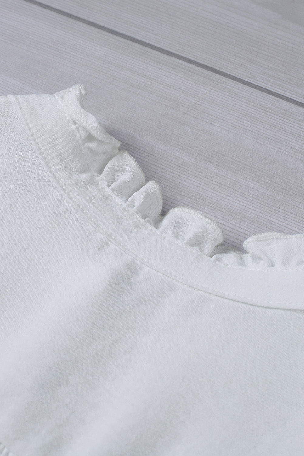 White Smocked Button Front V Neck Sleeveless Shirt